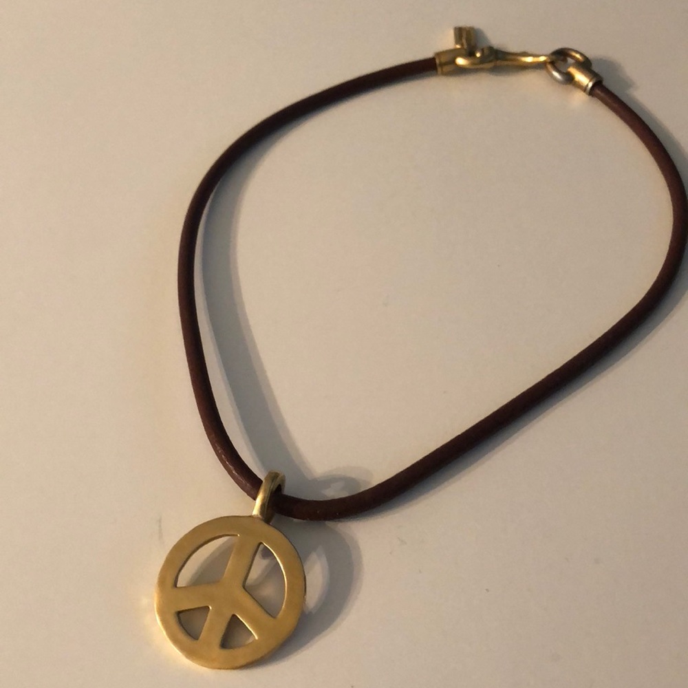 Leather and brass Coach peace sign necklace